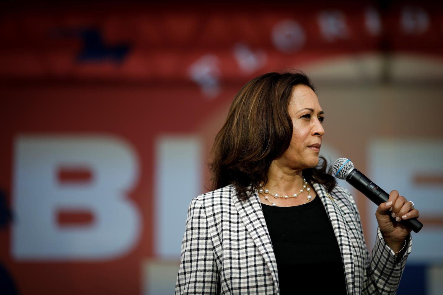 U.S. Democratic vice presidential nominee Senator Kamala Harris speaks during a drive-in campaign rally at Florida International University South Campus in Miami, Florida, U.S., October 31, 2020. REUTERS/Marco Bello