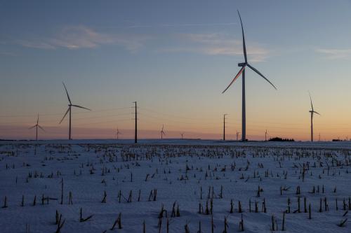 FILE PHOTO: A wind farm shares space with corn fields the day before the Iowa caucuses, where agriculture and clean energy are key issues, in Latimer, Iowa, U.S. February 2, 2020. REUTERS/Jonathan Ernst/File Photo