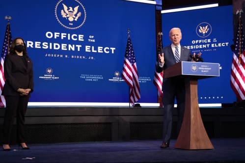 U.S. President-elect Joe Biden speaks about health care and the Affordable Care Act (Obamacare) as Vice President-elect Kamala Harris listens during a brief news conference at the theater serving as his transition headquarters in Wilmington, Delaware, U.S., November 10, 2020.  REUTERS/Jonathan Ernst  