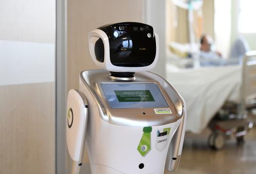 A robot helping medical teams treat patients suffering from the coronavirus disease (COVID-19) is pictured at the corridor, in the Circolo hospital, in Varese, Italy April 1, 2020. REUTERS/Flavio Lo Scalzo
