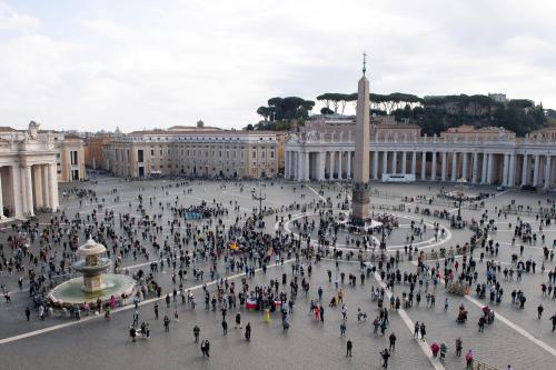 People stand at St Peter's Square as Pope Francis leads Angelus prayer from his window at the Vatican, November 16, 2020.   Vatican Media/?Handout via REUTERS    ATTENTION EDITORS - THIS IMAGE WAS PROVIDED BY A THIRD PARTY.