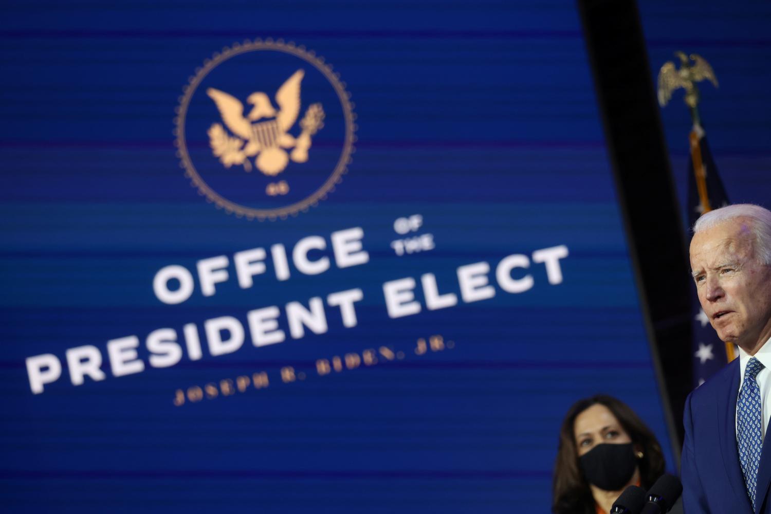 U.S. President-elect Joe Biden and Vice President-elect Kamala Harris face reporters after meeting with members of their coronavirus disease "Transition COVID-19 Advisory Board" in Wilmington, Delaware, U.S., November 9, 2020. REUTERS/Jonathan Ernst