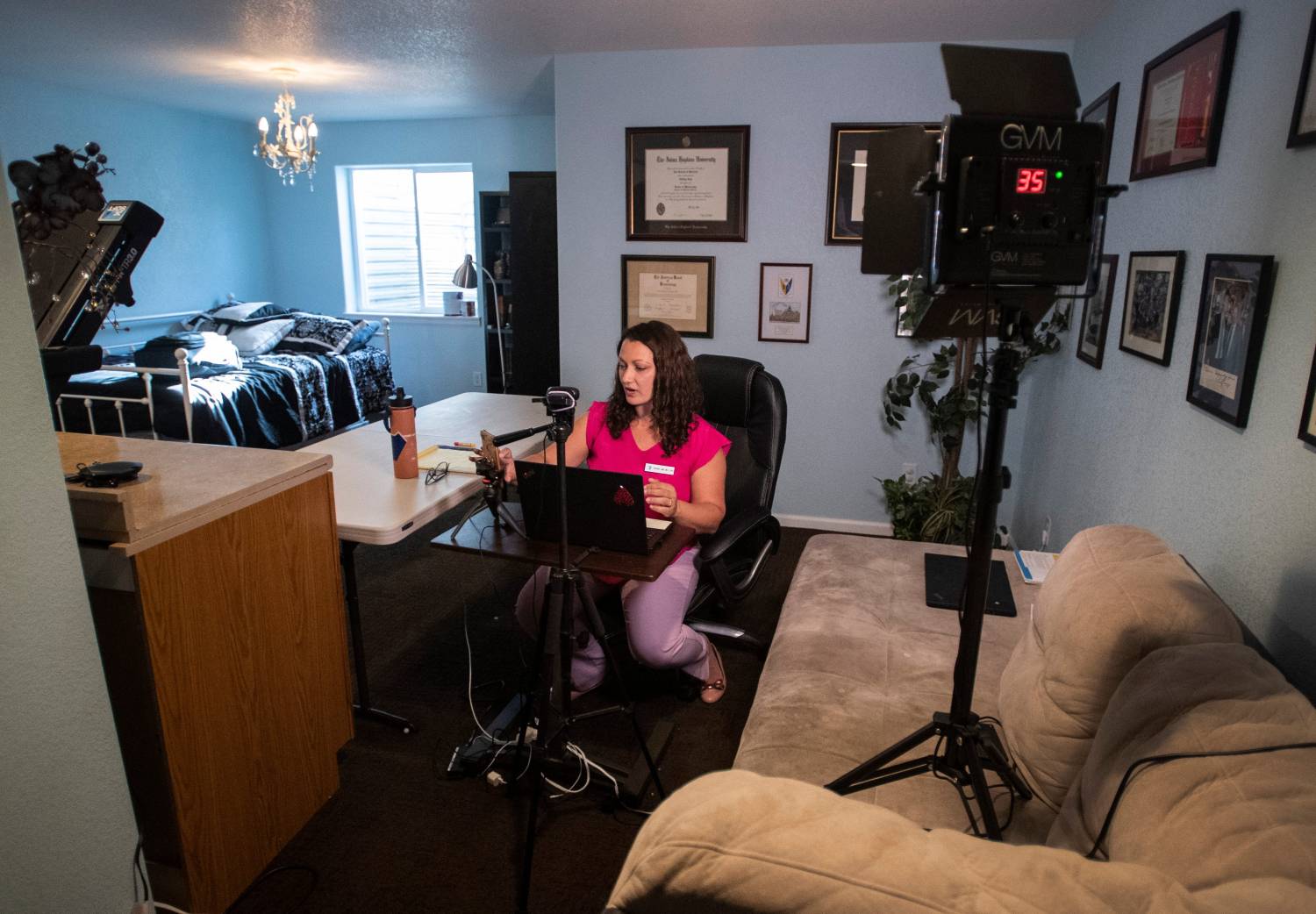 Dr. Tiffany Link gets ready to see a patient for a telehealth session in the spare bedroom in her home in Fort Collins, Colo. on Wednesday, May 20, 2020.052020 Telehealth 01 Bb