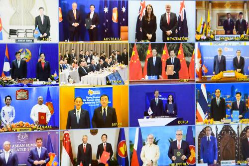 Australian Trade Minister Simon Birmingham and Australian Prime Minister Scott Morrison join ASEAN leaders for a virtual group photo after signing the Regional Comprehensive Economic Partnership (RCEP) during a virtual signing ceremony at Parliament House in Canberra, Sunday, November 15, 2020. Prime Minister Scott Morrison has joined ASEAN leaders virtually for the annual summit on trade and security, hosted by Vietnam. (AAP Image/Lukas Coch) NO ARCHIVINGNo Use Australia. No Use New Zealand.