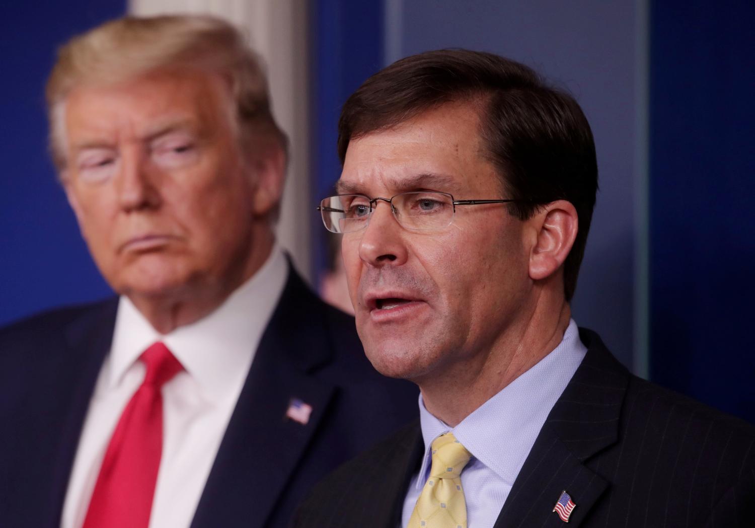 FILE PHOTO: U.S. President Donald Trump listens to Secretary of Defense Mark Esper address the daily White House coronavirus response briefing with members of the administration's coronavirus task force at the White House in Washington, U.S., March 18, 2020. REUTERS/Jonathan Ernst - RC2GMF9QPP29/File Photo