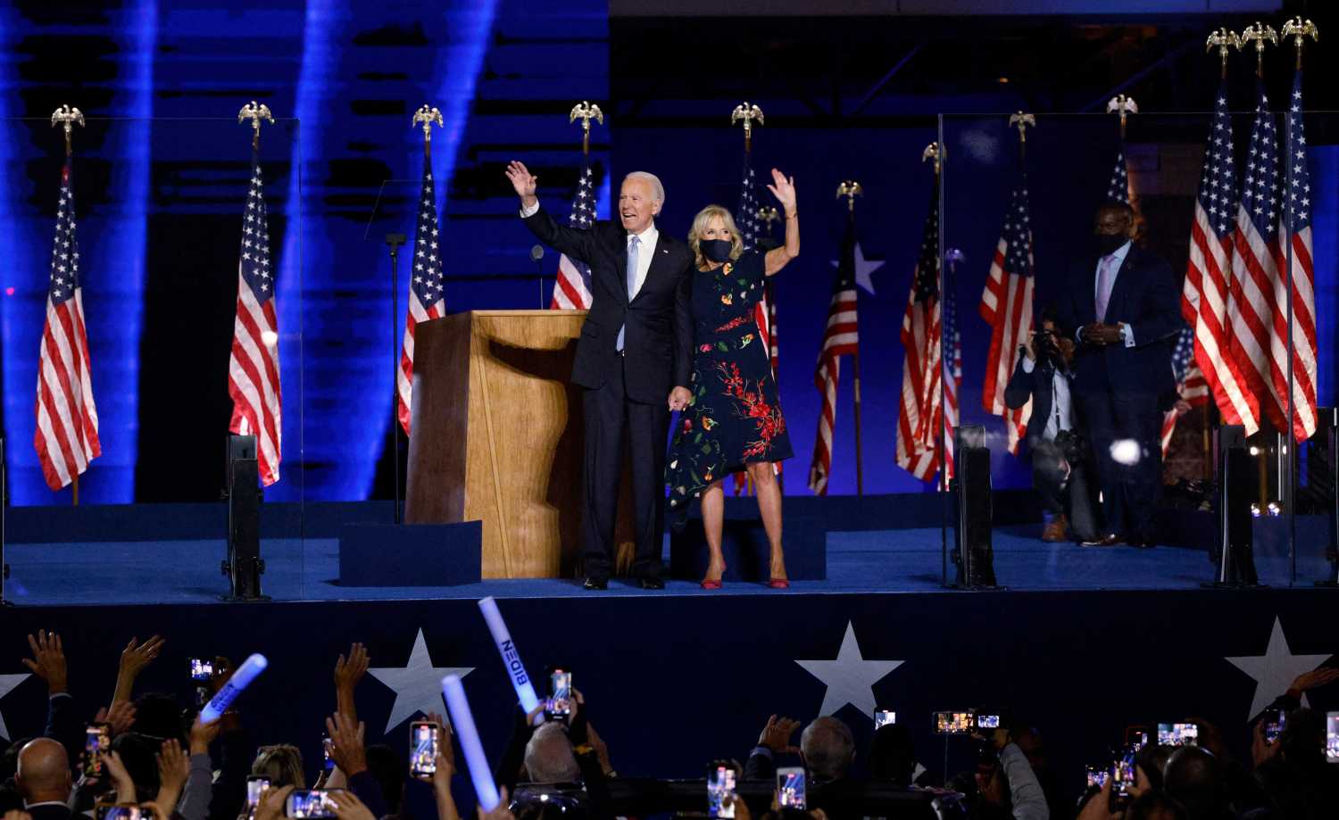 Democratic 2020 U.S. presidential nominee Joe Biden and his wife Jill wave to the crowd after speaking at his election rally, after the news media announced that Biden has won the 2020 U.S. presidential election over President Donald Trump, in Wilmington, Delaware, U.S., November 7, 2020. REUTERS/Jim Bourg