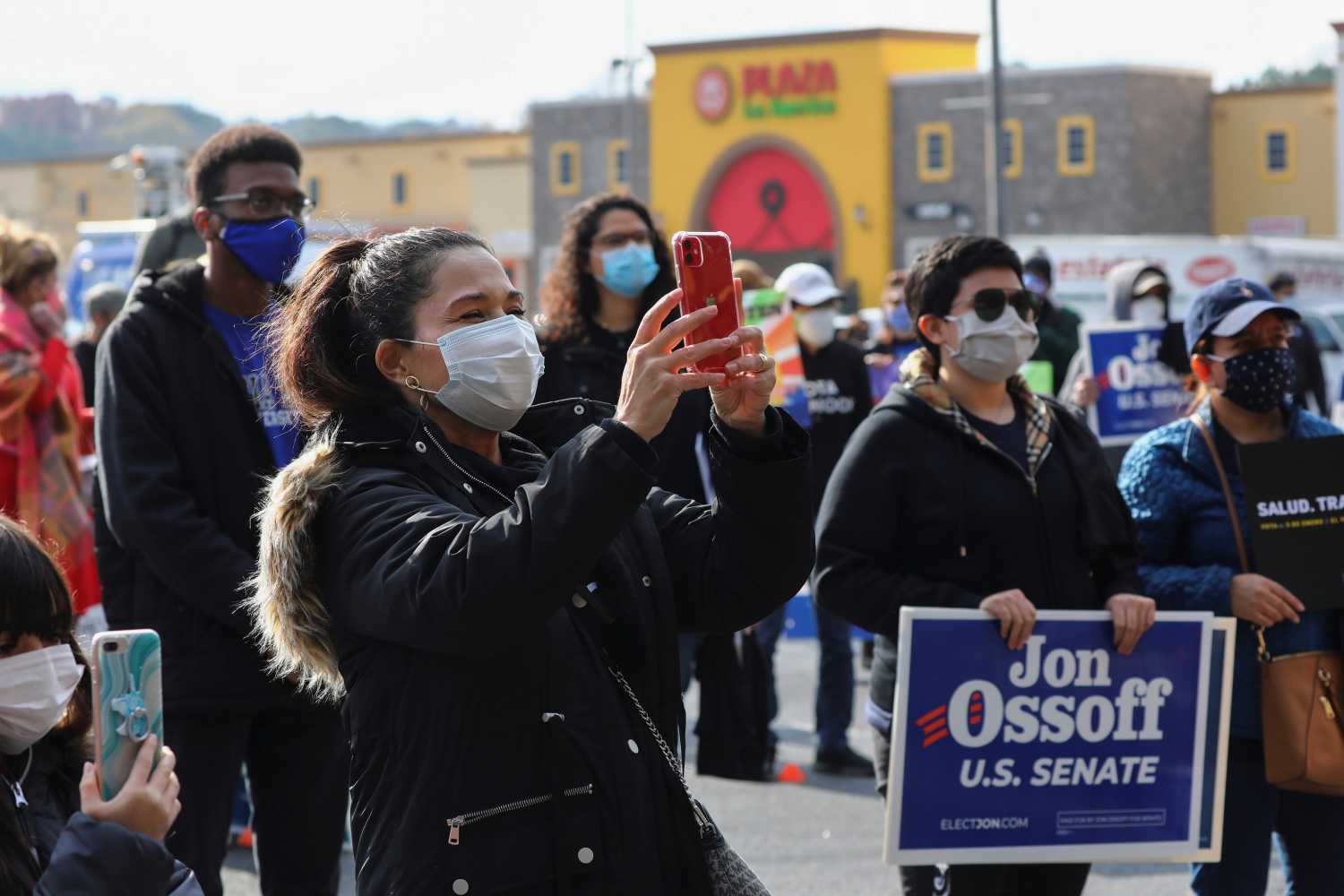People attend a Latino voter registration event in Lilburn, Georgia, U.S. December 7, 2020. REUTERS/Dustin Chambers