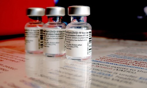 Dec 17, 2020; Freehold Township, NJ, USA; Empty Pfizer-BioNTech COVID-19 vaccine vials are shown at CentraState Medical Center in Freehold Township, NJ, Thursday, December 17, 2020.  The hospital started vaccinating its employees on Thursday.   Mandatory Credit: Thomas P. Costello-USA TODAY NETWORK