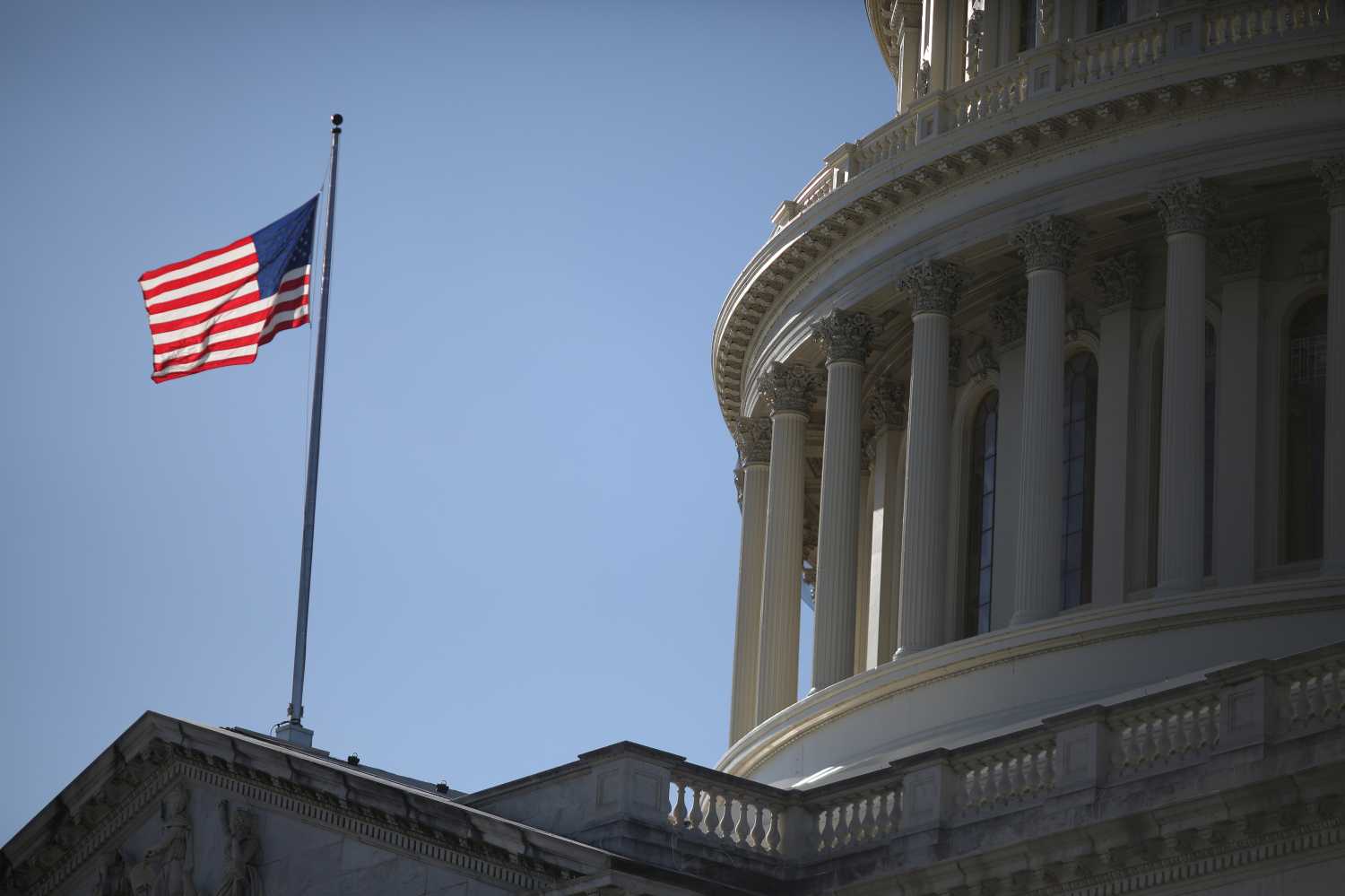 The American Flag flies at the U.S. Capitol in Washington, U.S., December 17, 2020. REUTERS/Tom Brenner