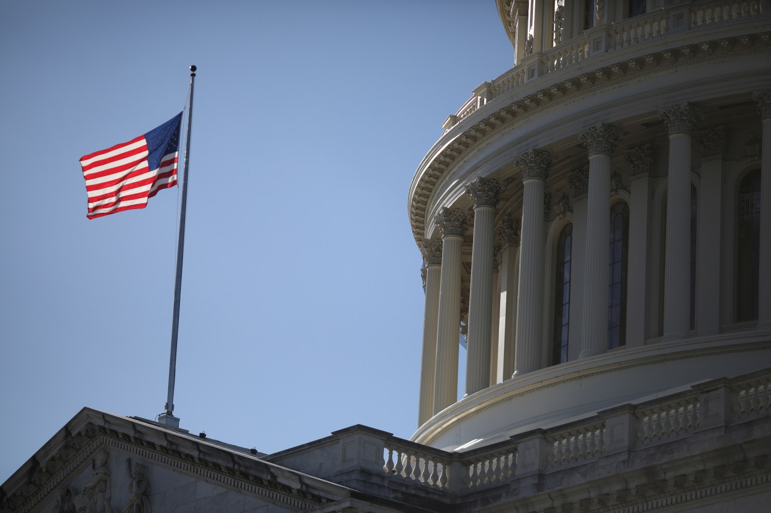 The American Flag flies at the U.S. Capitol in Washington, U.S., December 17, 2020. REUTERS/Tom Brenner