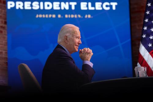 U.S. President-elect Joe Biden smiles during a national security conference video call at his transition headquarters in Wilmington, Delaware.