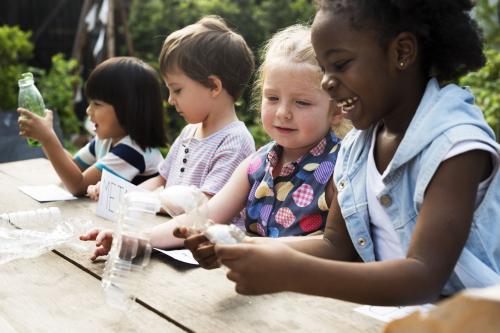 children having fun at a table.