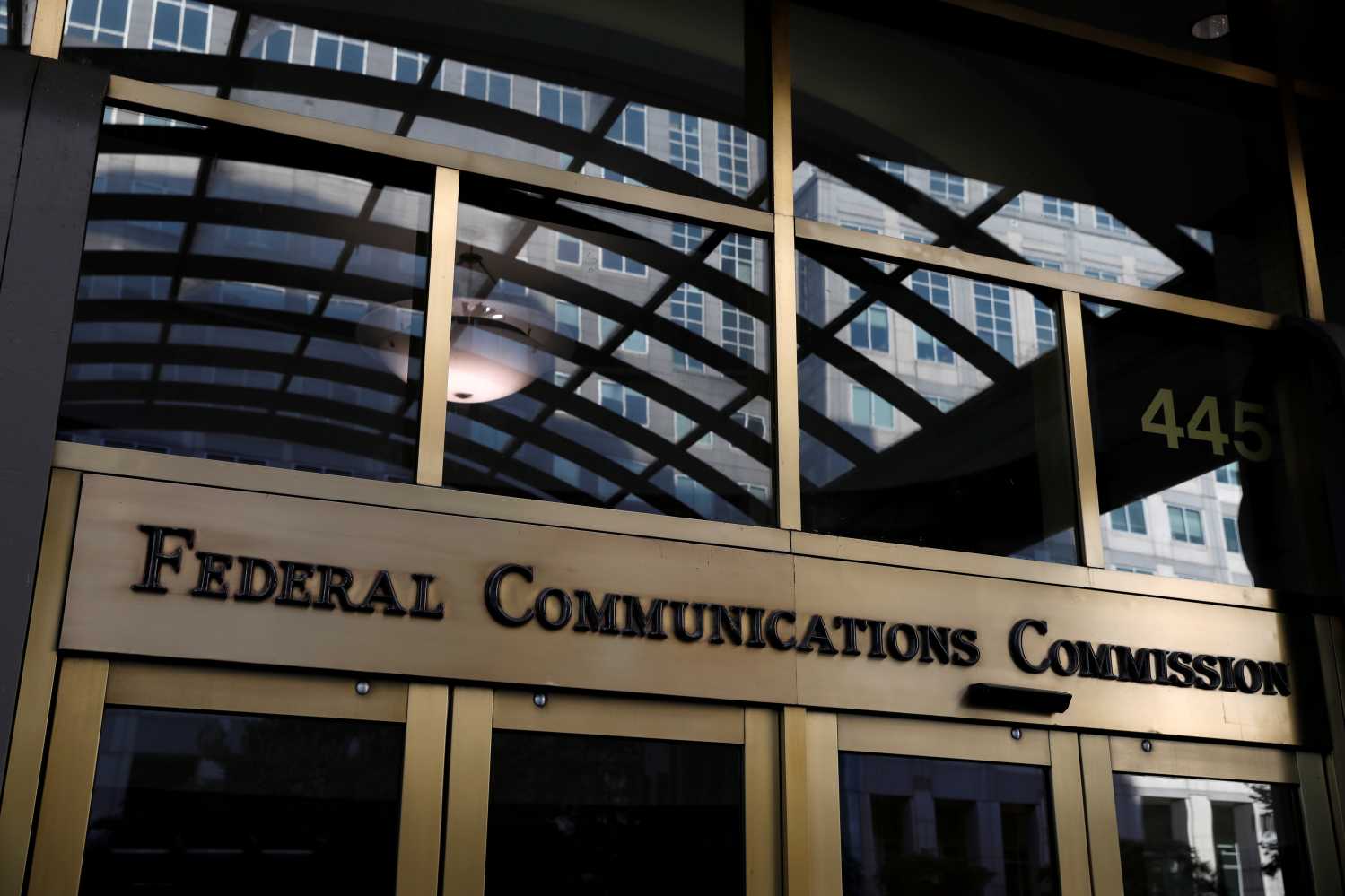 Signage is seen at the headquarters of the Federal Communications Commission in Washington, D.C., U.S., August 29, 2020.