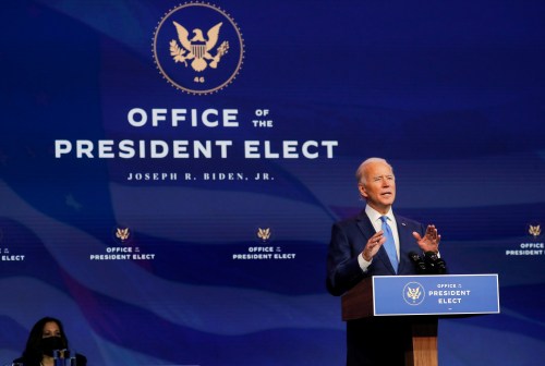 U.S. President-elect Joe Biden announces another round of nominees and appointees for his administration as U.S. Vice President-elect Kamala Harris listens during a news conference at his transition headquarters in Wilmington, Delaware, U.S., December 11, 2020. REUTERS/Mike Segar 