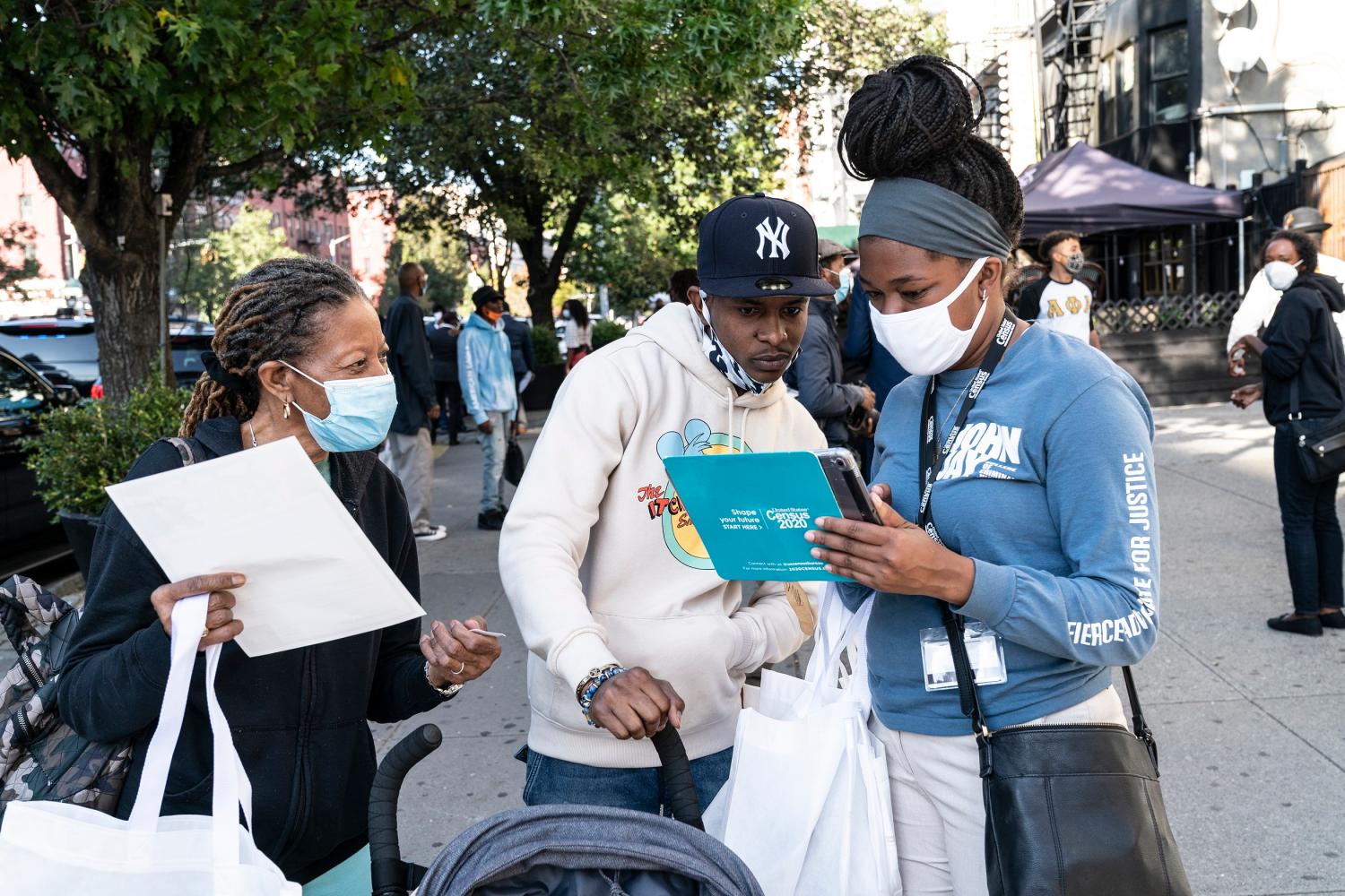 Census 2020 employee helps New Yorker fill census form at Sylvia's Restaurant in Harlem in New York on September 22, 2020 during Census Drive. Census Drive was coordinated with voter registration organized by Young Black Women protest group Freedom March NYC. (Photo by Lev Radin/Sipa USA)No Use UK. No Use Germany.