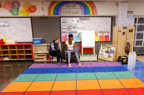 Kindergarten teacher Princess Bryant and paraprofessional Emily Lichtenstein (L) meet their incoming students and parents remotely before the first day of classes in the new school year at the Tynan Elementary School in Boston, Massachusetts, U.S., September 18, 2020.  Bryant will begin the school year teaching classes virtually from her classroom because of the coronavirus disease (COVID-19) pandemic.  REUTERS/Brian Snyder