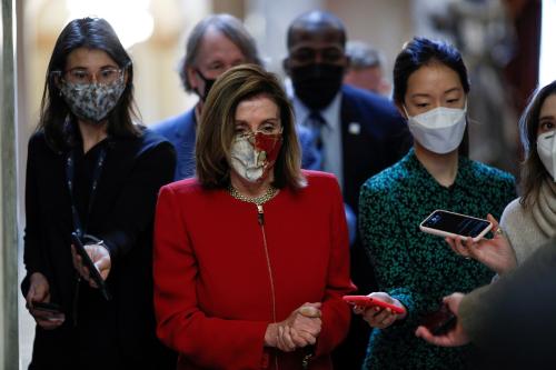 FILE PHOTO: U.S. Speaker of the House Nancy Pelosi (D-CA) speaks to reporters on Capitol Hill in Washington, U.S., December 3, 2020. REUTERS/Tom Brenner/File Photo