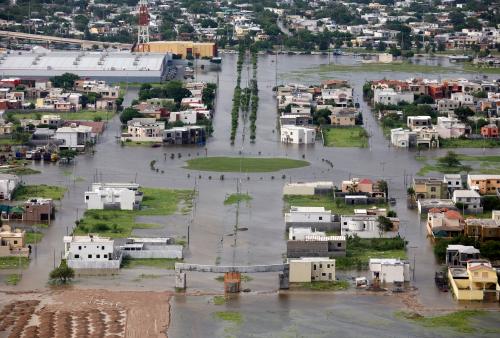 An aerial view of a flooded sector of the border city of Matamoros after being hit by Hurricane Dolly July 24, 2008. U.S. forecasters downgraded Dolly to a tropical depression on Thursday as it dissipated over South Texas. REUTERS/Tomas Bravo (MEXICO)
