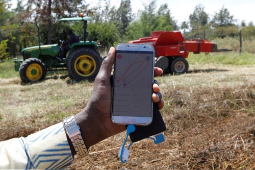 A mobile phone application shows movements of a John Deere 5503 tractor, installed with the Hello Tractor technology that connects farmers with vehicles' owners, in Umande village in Nanyuki, Kenya February 4, 2020. Picture taken February 4, 2020. REUTERS/Njeri Mwangi