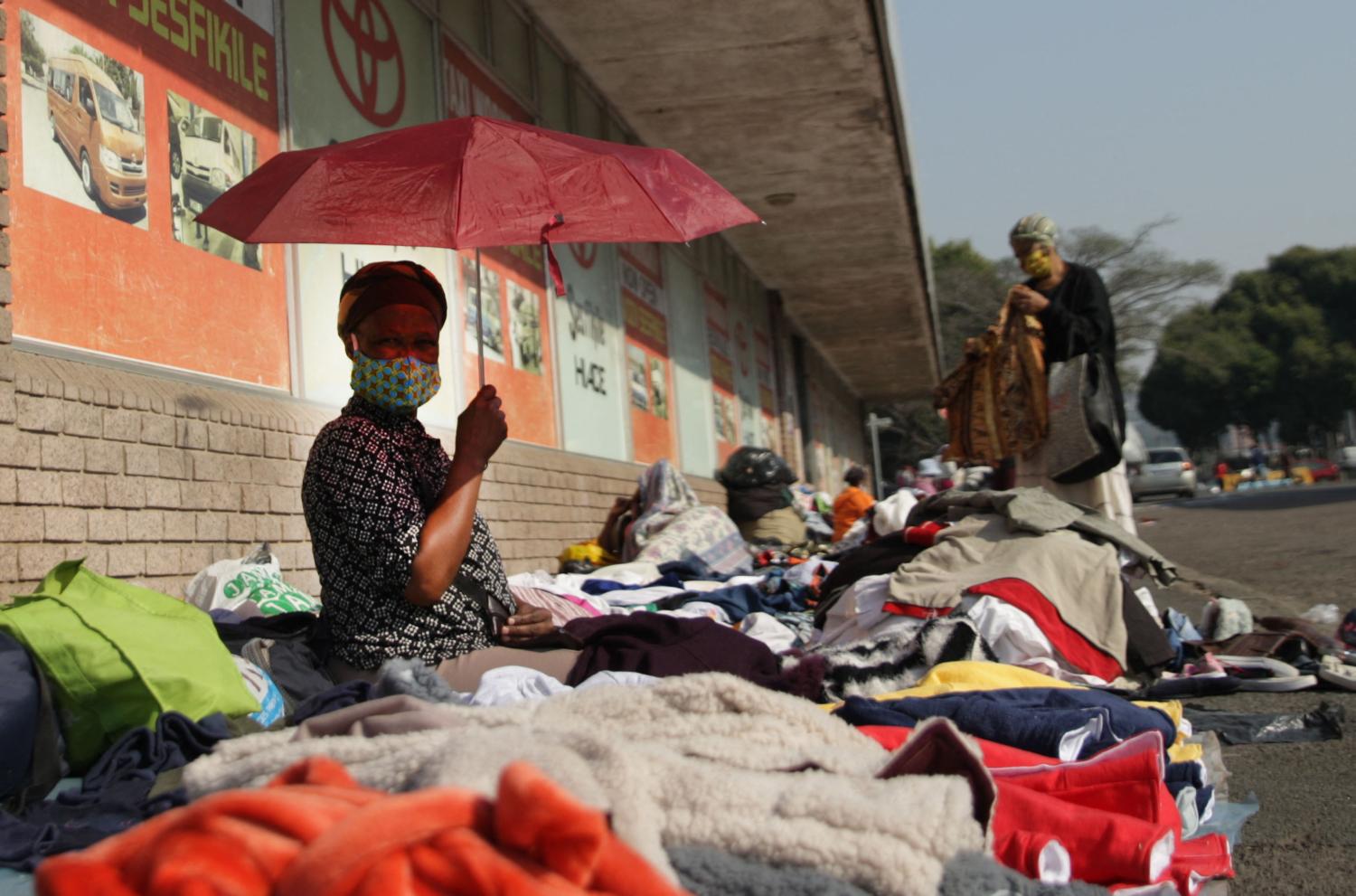 South Africa - Durban - 26 July 2020 - With the flea market closed, hawkers have taken to selling on the street to make ends meet. The women and men say that although they do not make as much money as they used to before what they do make is sufficientfor them to get by. Thembi Mbonambi of Maphephethweni. Photo by Bongani Mbatha/African News Agency/RealTime images/ABACAPRESS.COMNo Use South Africa out.