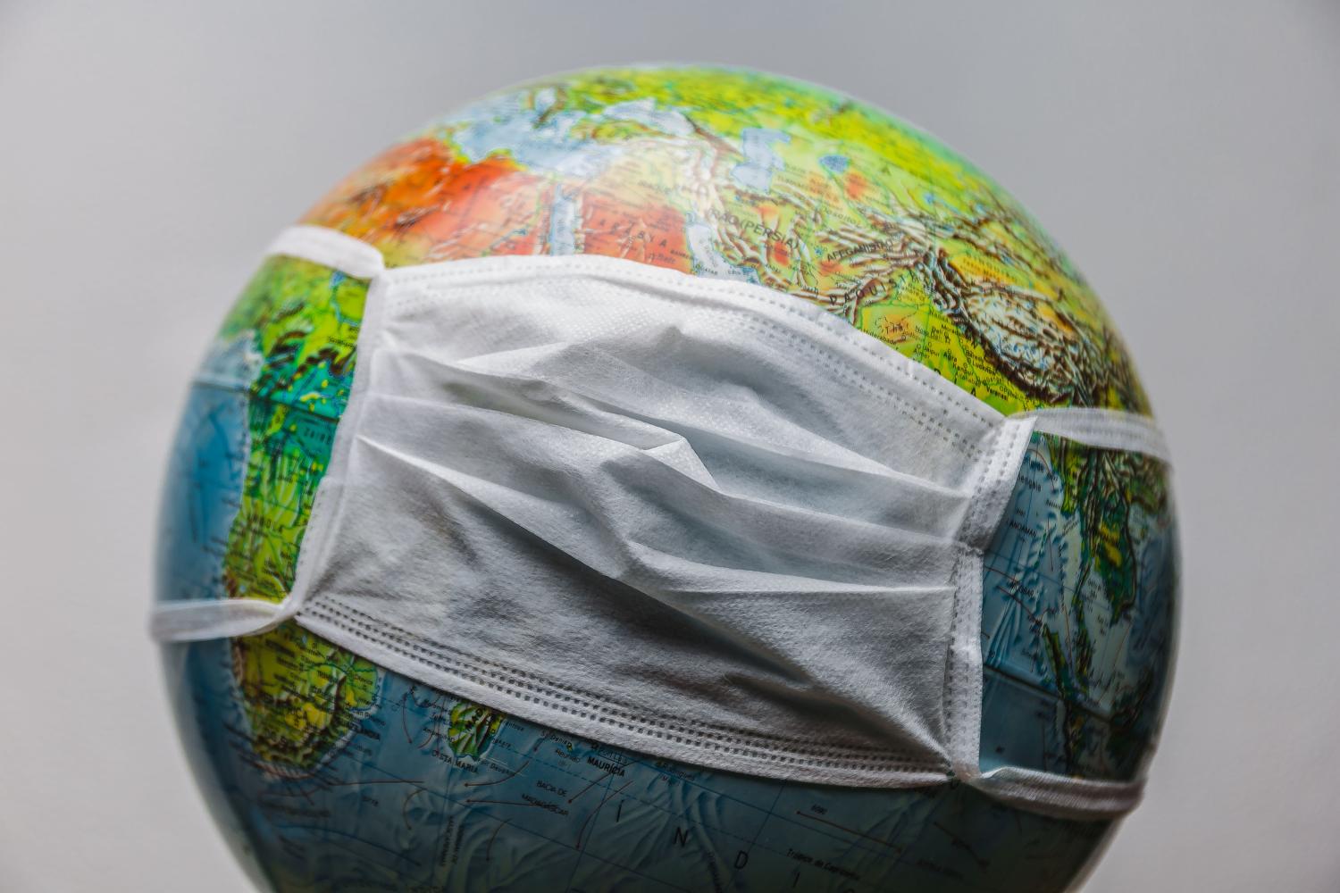 Globe covered with face mask