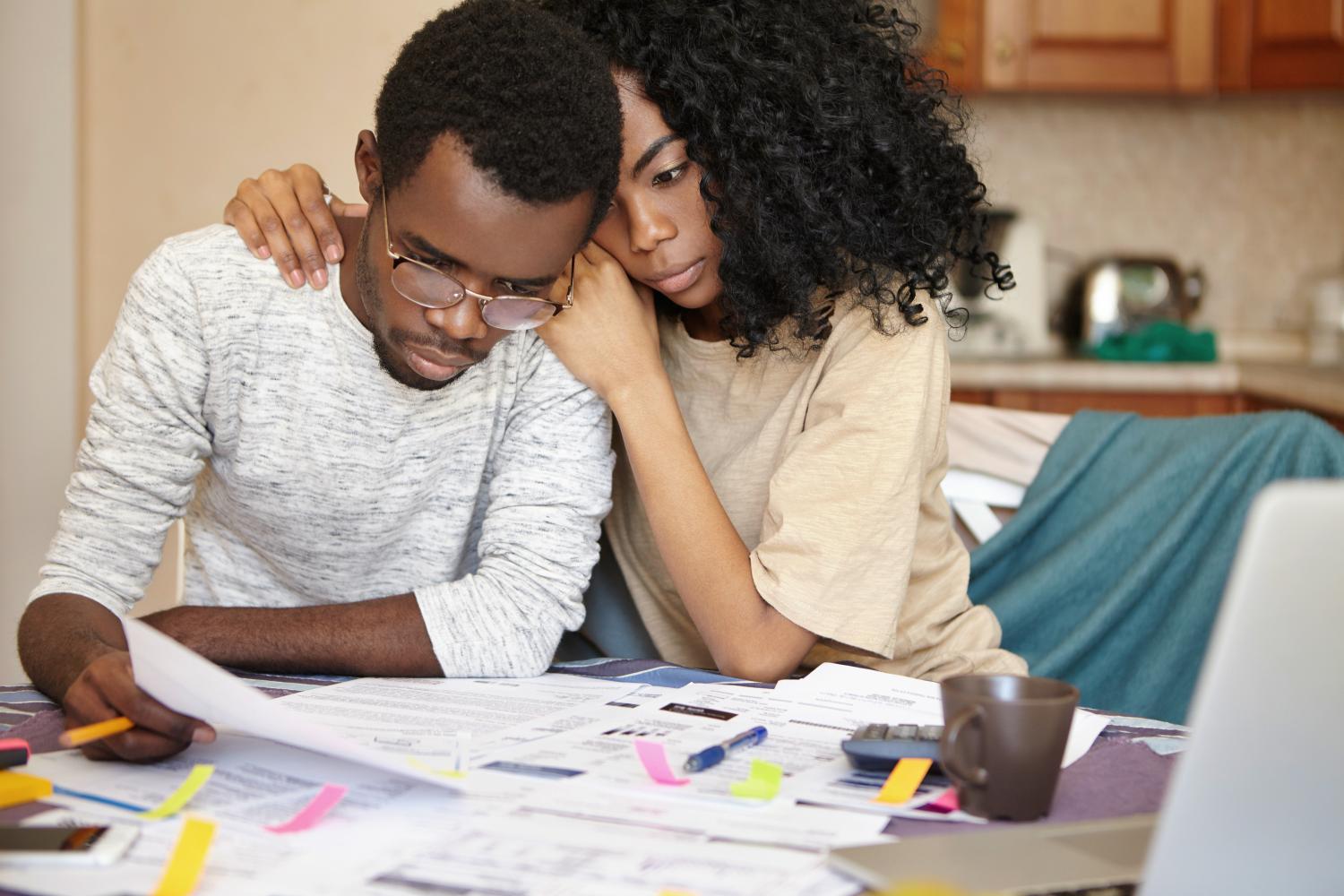 Stock photo of couple having difficulty with finances
