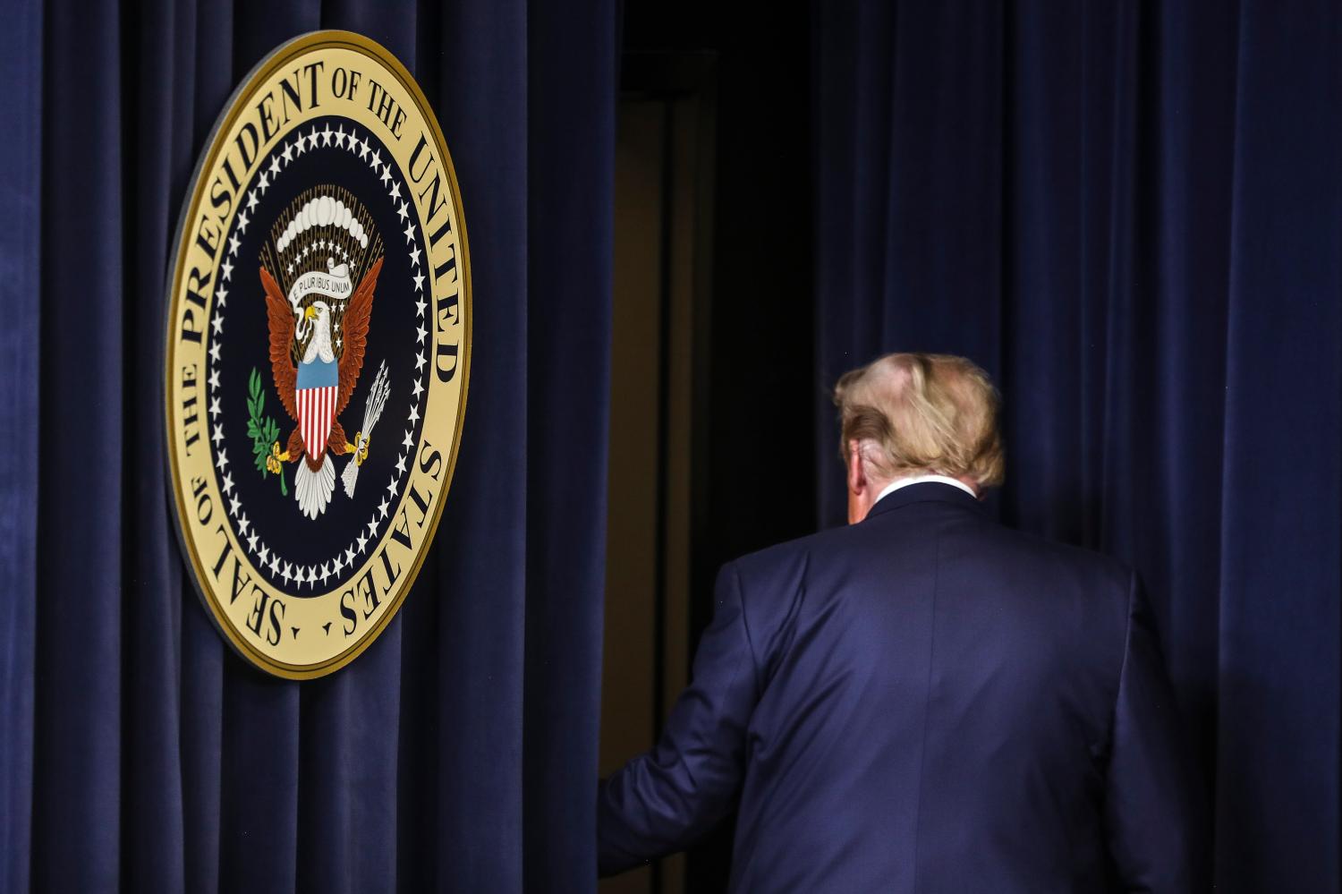 President Donald Trump walks out of the room after an Operation Warp Speed Vaccine Summit in the South Court Auditorium of the of the Eisenhower Executive Office Building at the White House on December 8, 2020 in Washington, DC. (Photo by Oliver Contreras/SIPA USA)No Use UK. No Use Germany.