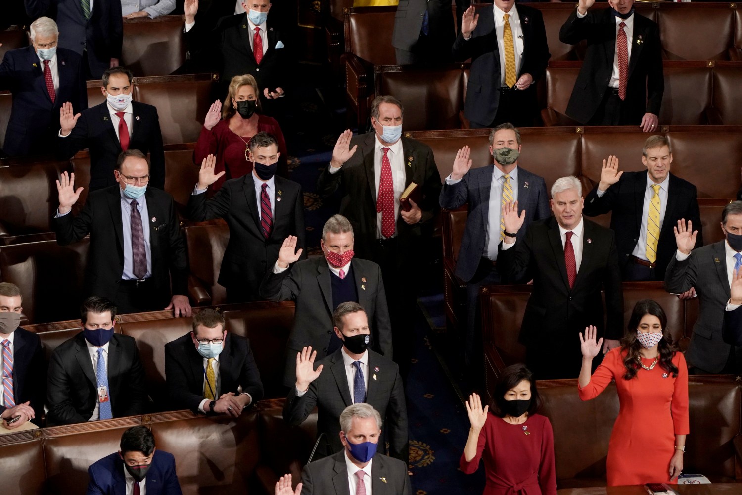 Republican members of the U.S. House of Representatives take their oath of office on the floor of the House Chamber during the first session of the 117th Congress on Capitol Hill in Washington, U.S., January 3, 2021.   REUTERS/Joshua Roberts     TPX IMAGES OF THE DAY