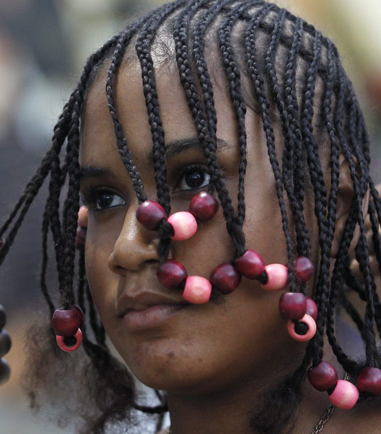 A girl gets an African-Colombian hairstyle during the Afro-hairstyles X Competition in Cali June 1, 2014. REUTERS/Jaime Saldarriaga (COLOMBIA - Tags: SOCIETY)
