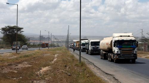 Trucks drive along the main road from the port city of Mombasa in the outskirts of Kenya's capital Nairobi.