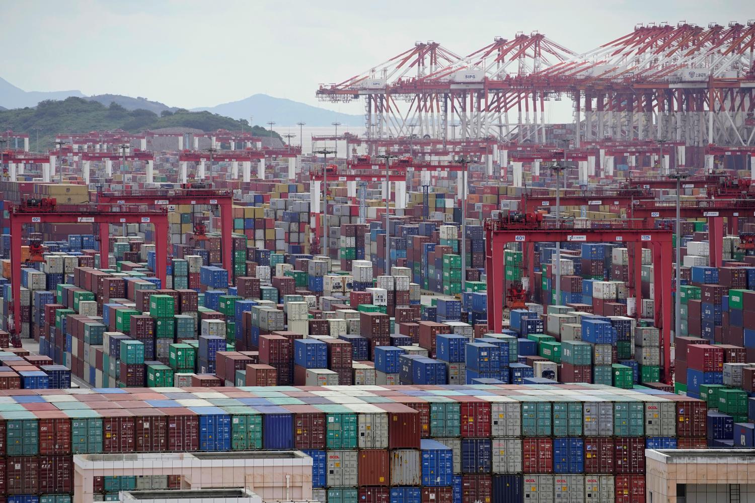 FILE PHOTO: Containers are seen at the Yangshan Deep-Water Port in Shanghai, China October 19, 2020. REUTERS/Aly Song