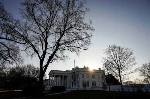 The sun rises over the White House in Washington, U.S., January 7, 2021. REUTERS/Joshua Roberts