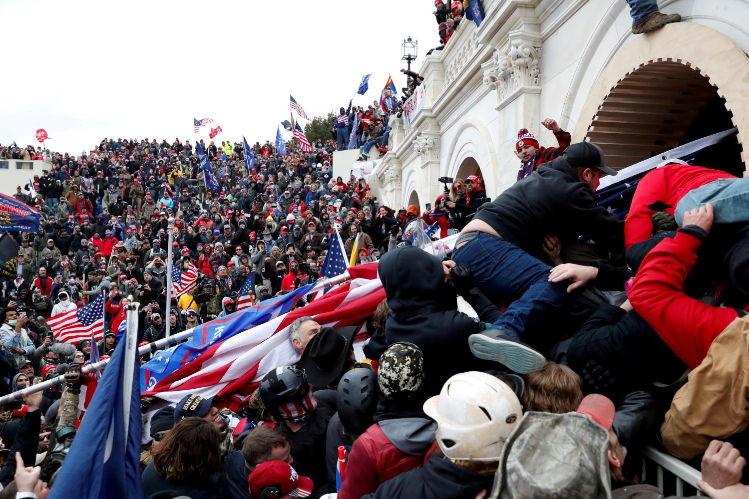 FILE PHOTO: Pro-Trump protesters storm into the U.S. Capitol during clashes with police, during a rally to contest the certification of the 2020 U.S. presidential election results by the U.S. Congress, in Washington, U.S, January 6, 2021. REUTERS/Shannon Stapleton/File Photo