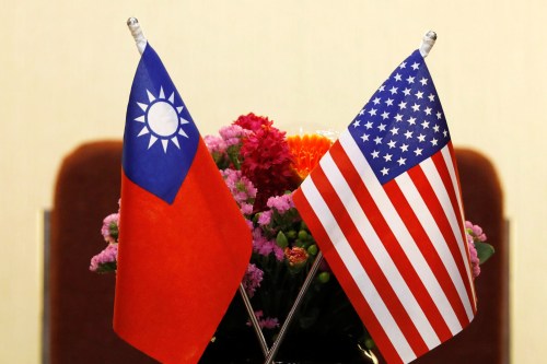 FILE PHOTO: Flags of Taiwan and U.S. are placed for a meeting between U.S. House Foreign Affairs Committee Chairman Ed Royce speaks and with Su Chia-chyuan, President of the Legislative Yuan in Taipei, Taiwan March 27, 2018. REUTERS/Tyrone Siu