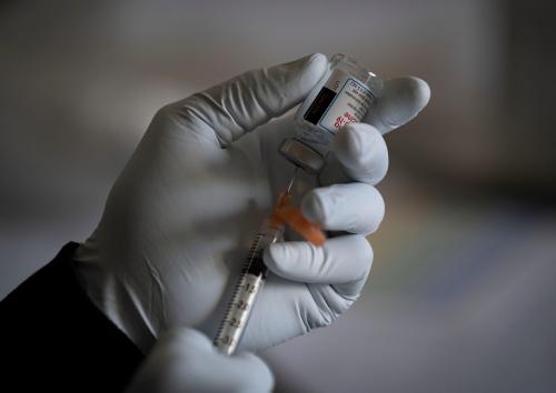 A firefighter/paramedic prepares a shot of the Moderna COVID-19 vaccination at the Tequesta Fire Departmenton January 15, 2021 in Tequesta, Florida. The city received 50 doses. There are 1600 residets that are 65 and older. The online appointments were taken in under three minutes. GREG LOVETT/PALM BEACH POSTTequesta Va3