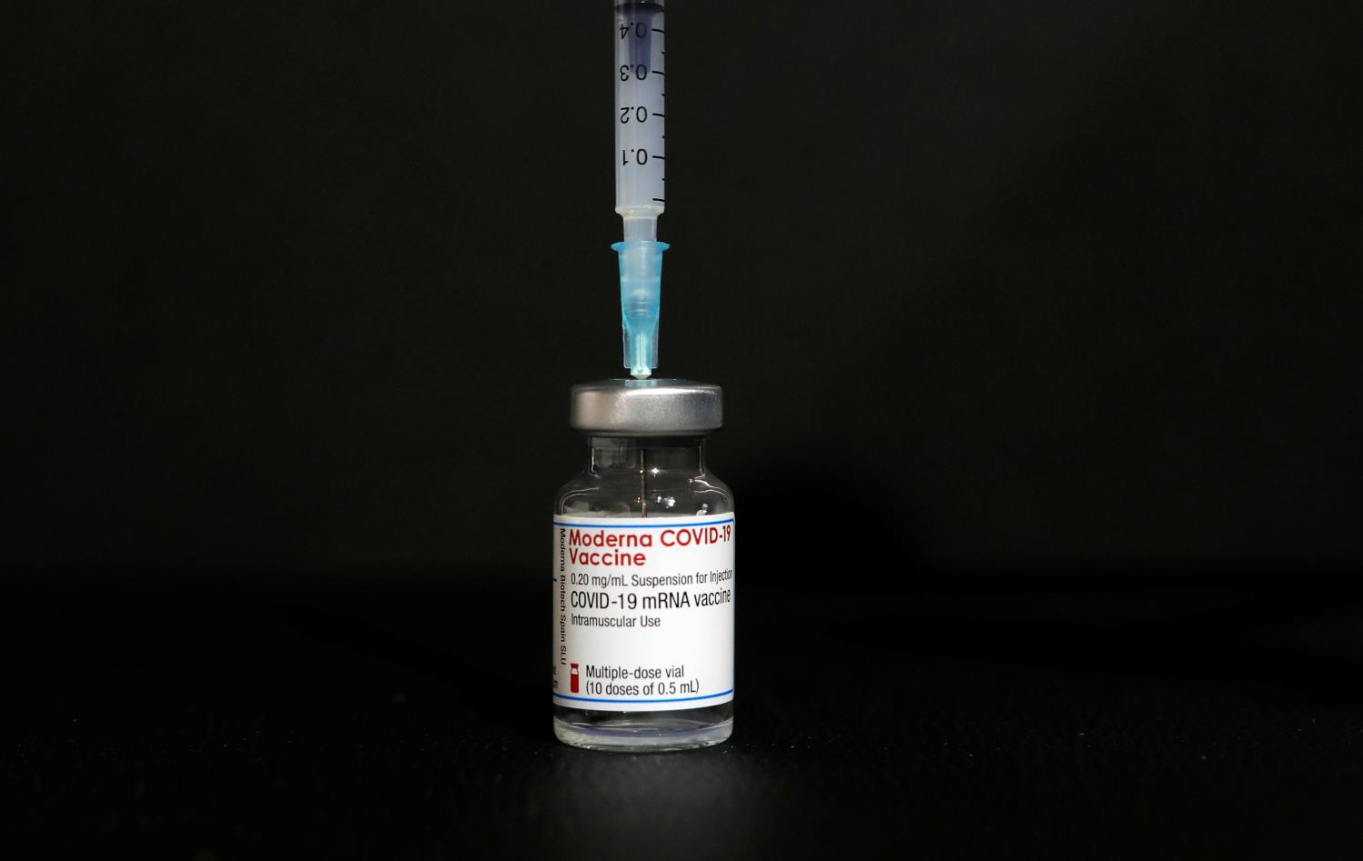 A vial of the Moderna COVID-19 vaccine is seen at a vaccination center.