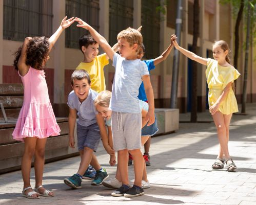 children play in a city
