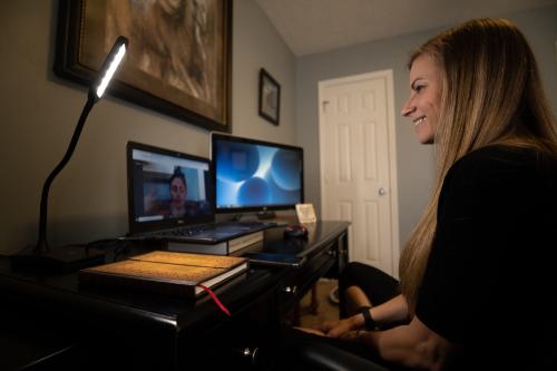 Licensed professional clinical counselor  Aimee Vaughn with Guidestar counseling, working from home as she speaks with a client virtually through Telehealth, April.9, 2020.A Vaughn 1