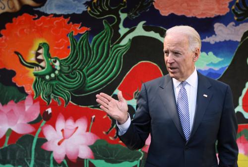 United States Vice President Joe Biden talks to reporters at the International Studies Learning Center where he visited with Chinese Vice President Xi Jinping in Los Angeles, California February 17, 2012. Vice President Xi, China's leader-in-waiting to President Hu Jintao, is wrapping up a five-day visit to the United States with a two days of business talks Los Angeles.   REUTERS/David McNew (UNITED STATES - Tags: POLITICS EDUCATION)