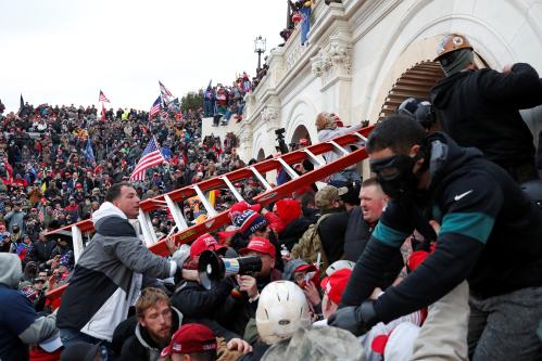 Pro-Trump protesters storm into the U.S. Capitol during clashes with police, during a rally to contest the certification of the 2020 U.S. presidential election results by the U.S. Congress, in Washington, U.S, January 6, 2021. REUTERS/Shannon Stapleton