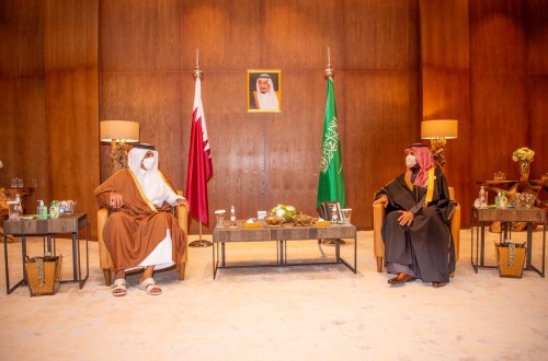 Saudi Arabia's Crown Prince Mohammed bin Salman meets Qatar's Emir Sheikh Tamim bin Hamad al-Thani during the Gulf Cooperation Council's (GCC) 41st Summit in Al-Ula, Saudi Arabia January 5, 2021. Bandar Algaloud/Courtesy of Saudi Royal Court/Handout via REUTERS ATTENTION EDITORS - THIS PICTURE WAS PROVIDED BY A THIRD PARTY