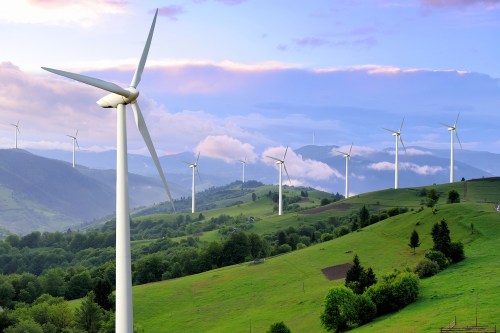 Wind turbines on a hillside.