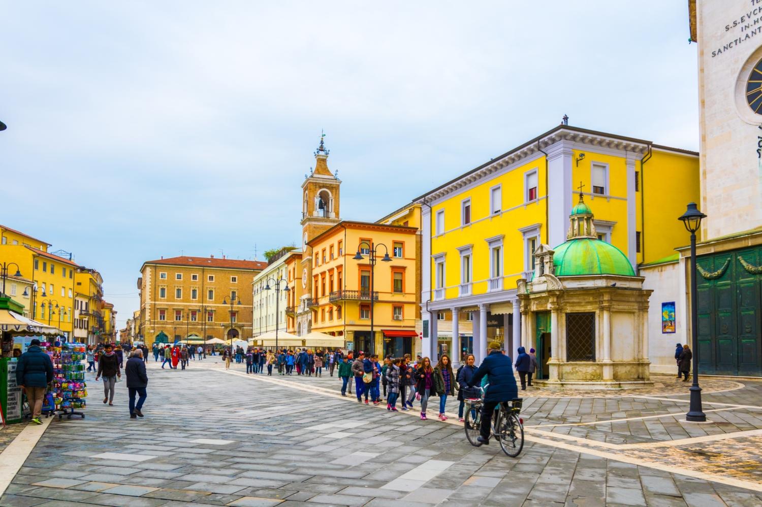 RIMINI, ITALY, MARCH 16, 2016: people are passing through piazza martiri