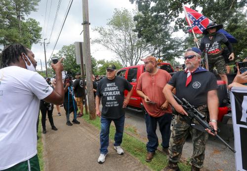 NO FILM, NO VIDEO, NO TV, NO DOCUMENTARY - Counter protesters face off with protesters as several far-right groups, including militias and white supremacists, rally Saturday, August 15, 2020, in Stone Mountain, GA, USA, while a broad coalition of leftist anti-racist groups organized a counter-demonstration. Photo by Jenni Girtman/Atlanta Journal-Constitution/TNS/ABACAPRESS.COM