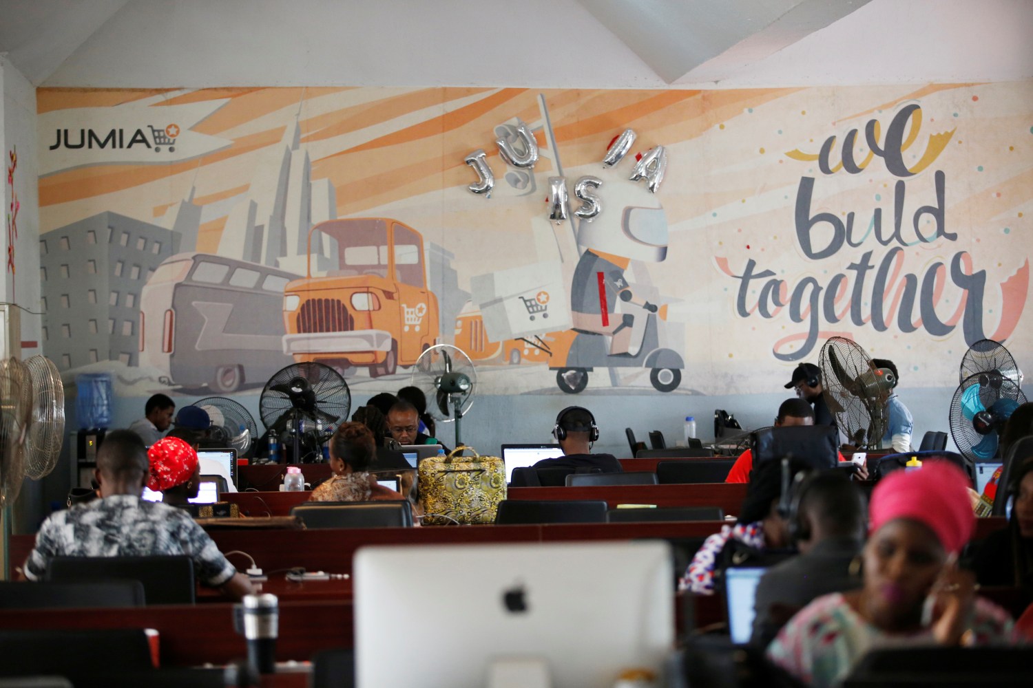 People work on computers at the offices of online retailer Jumia in Nigeria's commercial capital, Lagos.