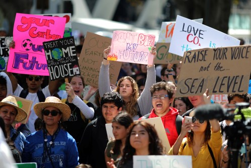 Students attend a protest rally to call for urgent action to slow the pace of climate change, in Los Angeles, California, U.S., March 15, 2019.  REUTERS/Lucy Nicholson