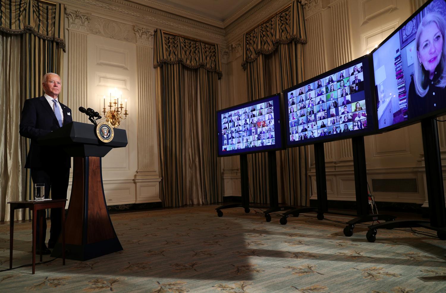 U.S. President Joe Biden swears in presidential appointees in a virtual ceremony in the State Dining Room of the White House in Washington, after his inauguration as the 46th President of the United States, U.S., January 20, 2021. REUTERS/Tom Brenner