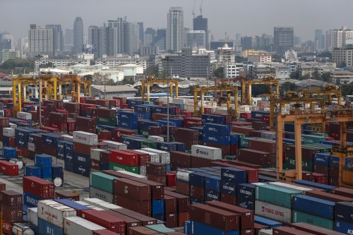 FILE PHOTO: Shipping containers stand at a port in Bangkok, Thailand, March 25, 2016.  REUTERS/Athit Perawongmetha/File Photo