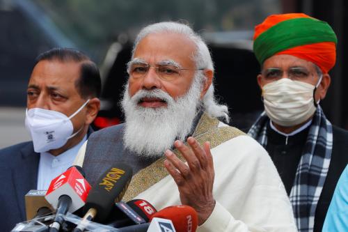 India's Prime Minister Narendra Modi speaks with the media as he arrives at the parliament house to attend the first day of the budget session, in New Delhi, India, January 29, 2021. REUTERS/Adnan Abidi