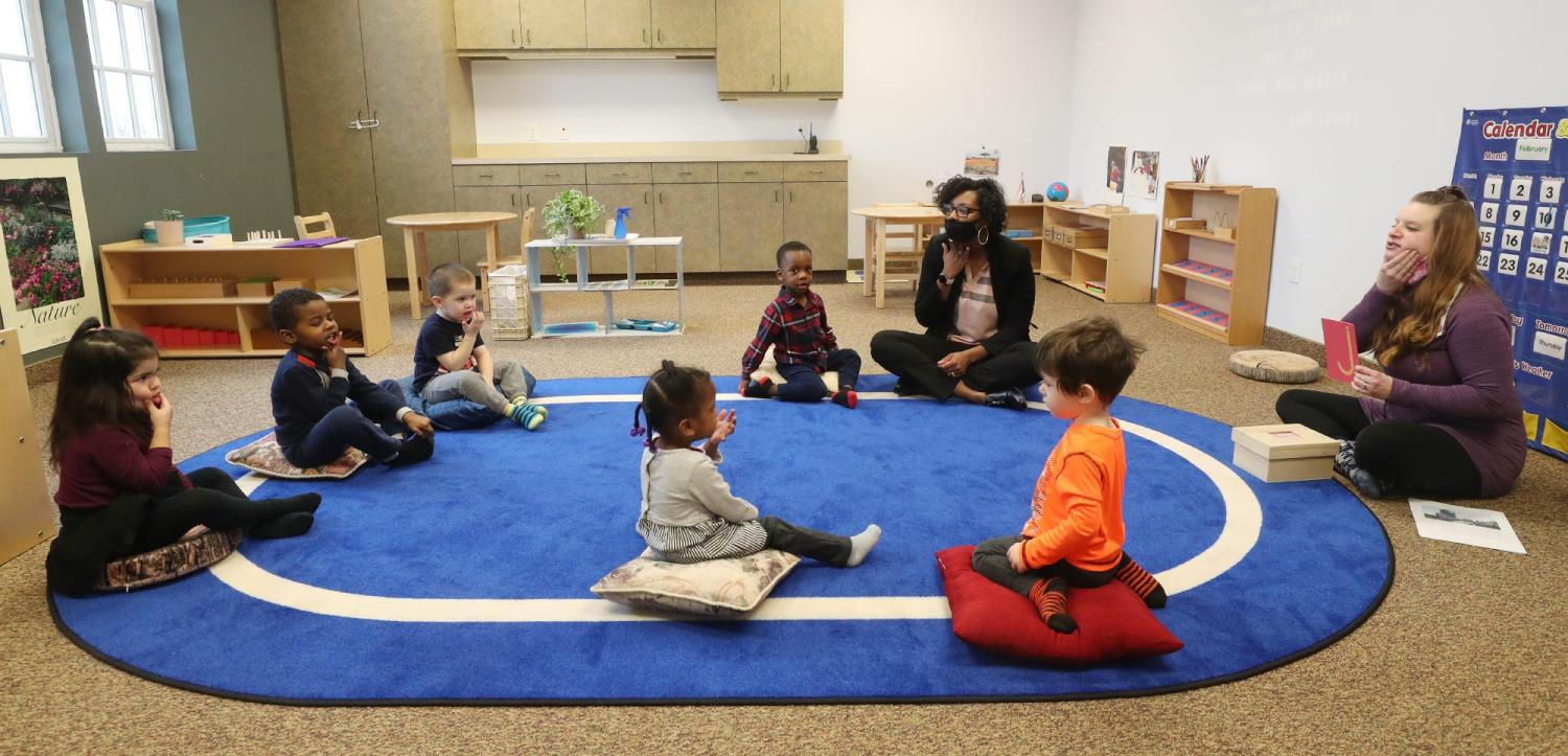 Lydia Stephens, owner/director of Montessori Life preschool, second from right, works with teacher Brandi Crawford, right, with the children at the preschool in Macedonia.Bob Montessory Life 4